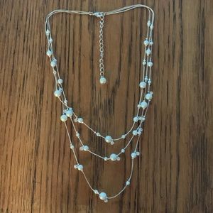 Multi strand Silvertone, pearl and pave crystal accent necklace